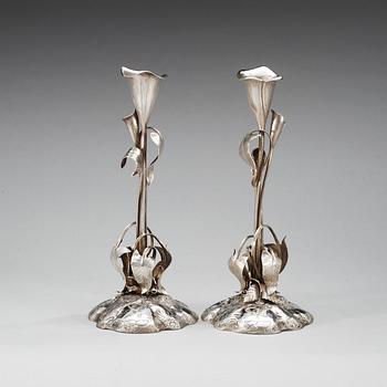 A pair of Swedish 19th century silver canlesticks, makers mark of Gustaf Möllenborg, Feron, Stockholm 1852.