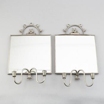 Two pewter wall sconces from Firma Svenskt Tenn, 1925.