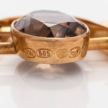 Eero Rislakki, halssmycke, fasettslipade rökkvartser, 14K guld. Westerback, 1960.