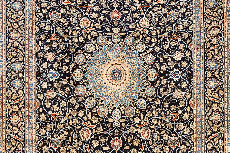 A Kashan carpet, c. 397 x 300 cm.