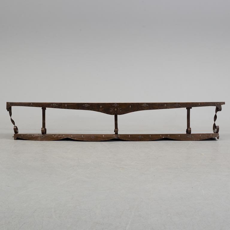 An early 1900s art nouveau shelf.