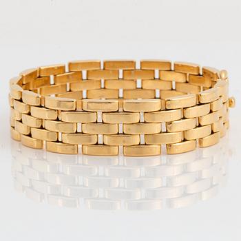 An 18K gold Cartier bracelet "Maillon Panthere".