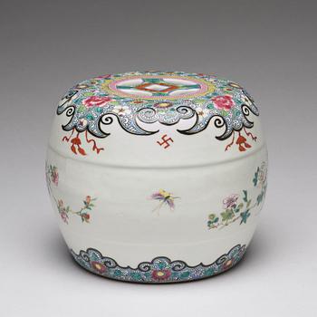 A small famille rose garden seat/stand, Qing dynasty, circa 1900.
