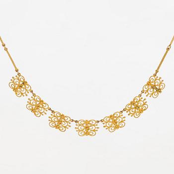 Esko Raitanen, collier, armband och örhängen, 14K guld, Helsingfors 1972.