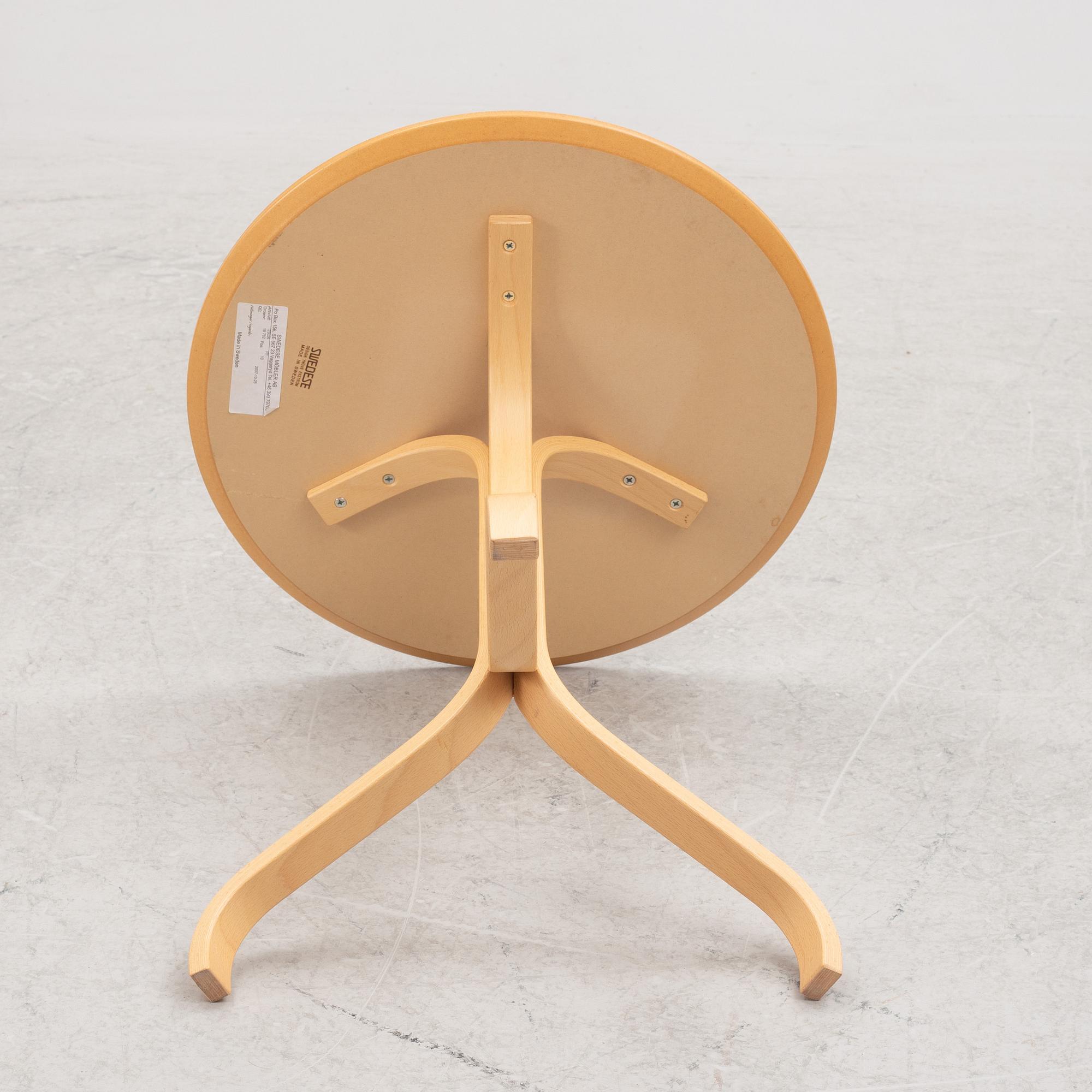 Yngve Ekström, a "Lamino" side table and an "Lamino" ottoman, Swedese, Sweden, 2007.
