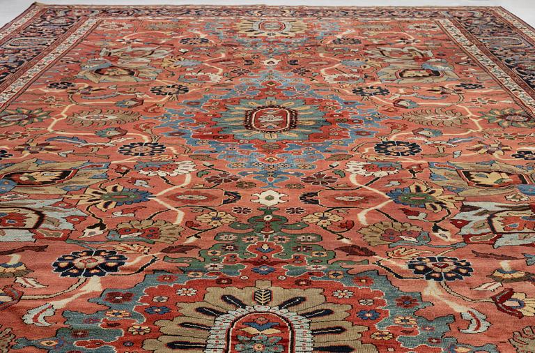 A Sultanabad carpet, west Persia c. 530 x 378 cm.