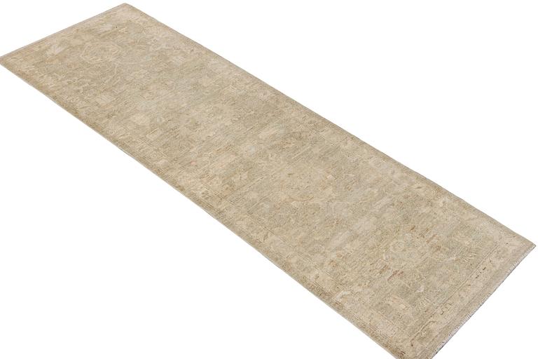 An Ushak runnercarpet, c. 295 x 87 cm.
