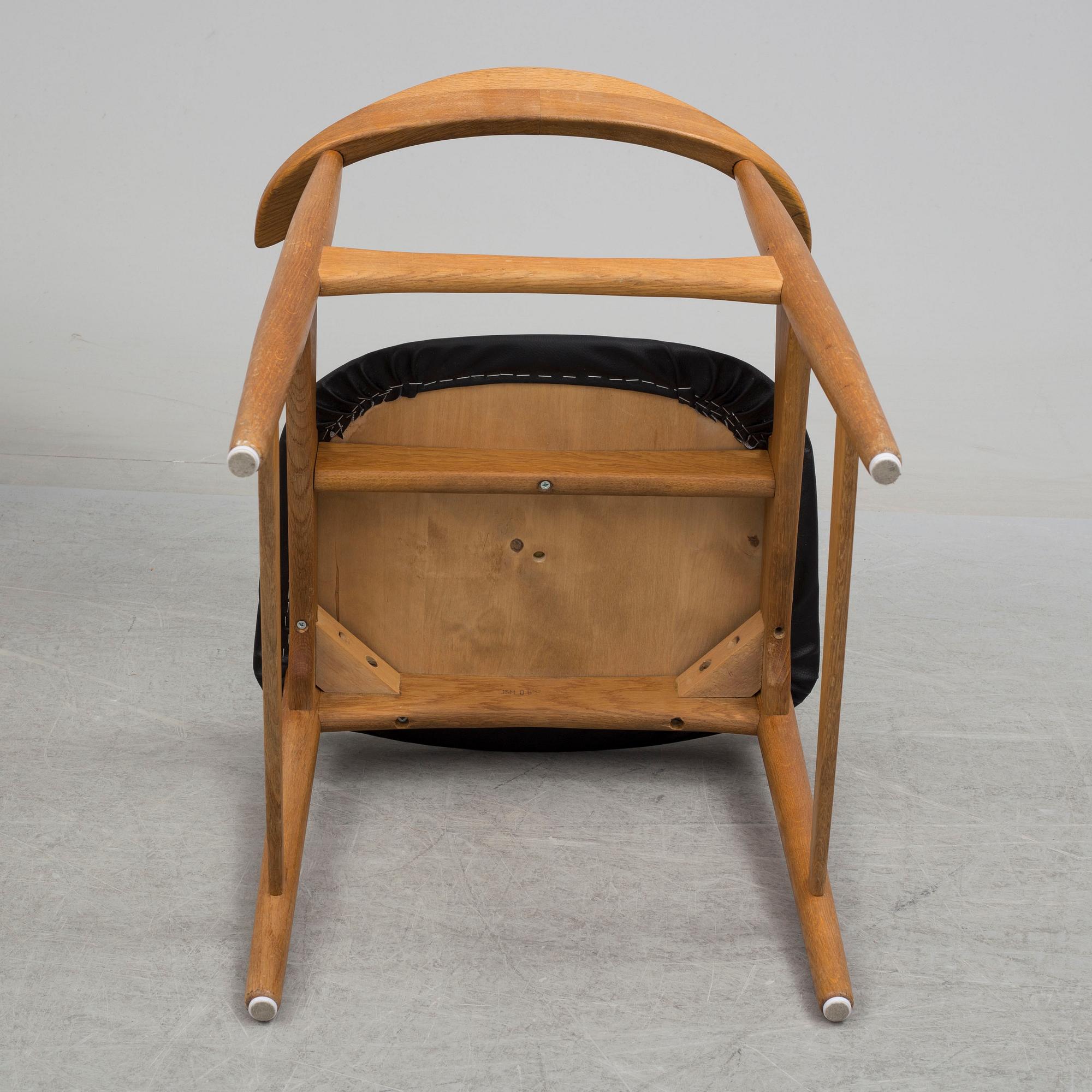 A pair of 1960's 'Danske' oak armchairs by Erik Wörtz IKEA.