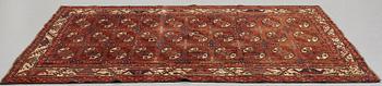 Matto, an antique Yomoud khali (main carpet), ca 244-249,5 x 172,5-174,5 cm.