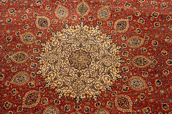 A carpet, semi-antique Tabriz, ca 398 x 290 cm.