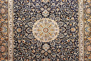 A Kashan carpet, c. 383 x 310 cm.