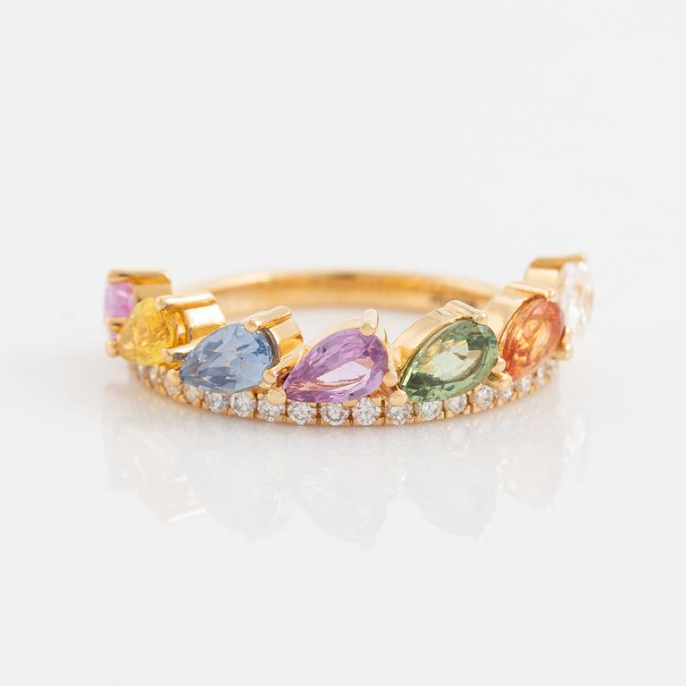 Multi coloured sapphire and brilliant cut diamond ring.