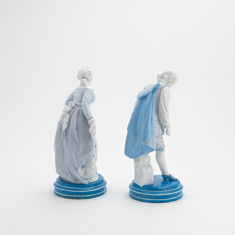 Two pocelain figurines, Meissen-like marks, probably early 20th century.