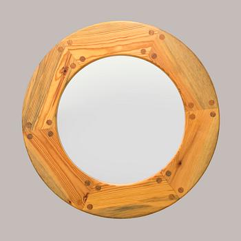 A round mirror in pine wood by Luxus, second half of 20th century.