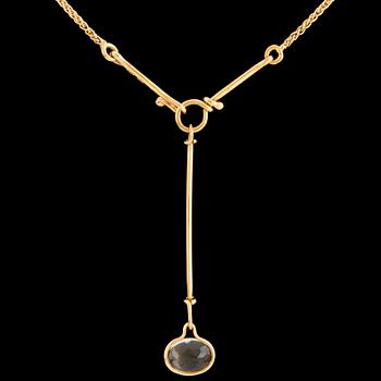 A 'Savannah' pendant set with a faceted citrine by Vivianna Torun Bülow Hübe for Georg Jensen, designed 2006.