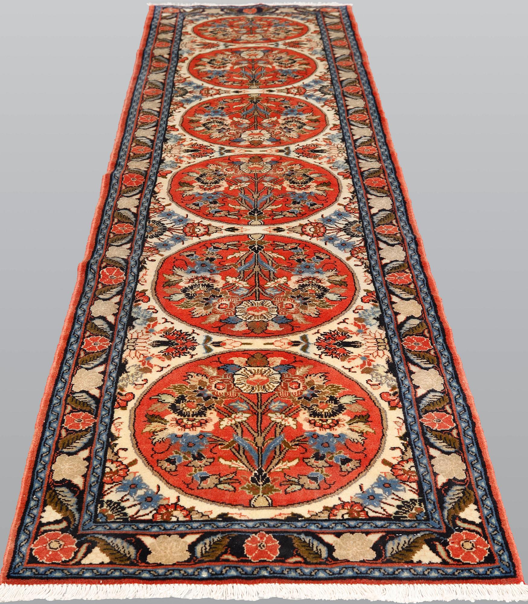 A Hamadan runner, ca 310 x 81 cm.
