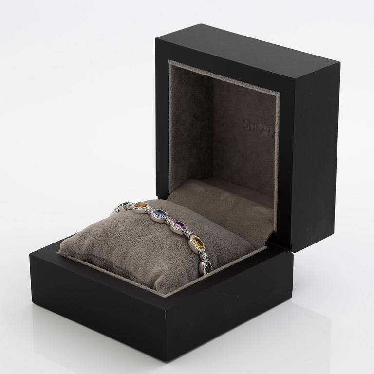Bracelet 18K white gold set with oval-cut multicoloured sapphires and brilliant-cut diamonds.