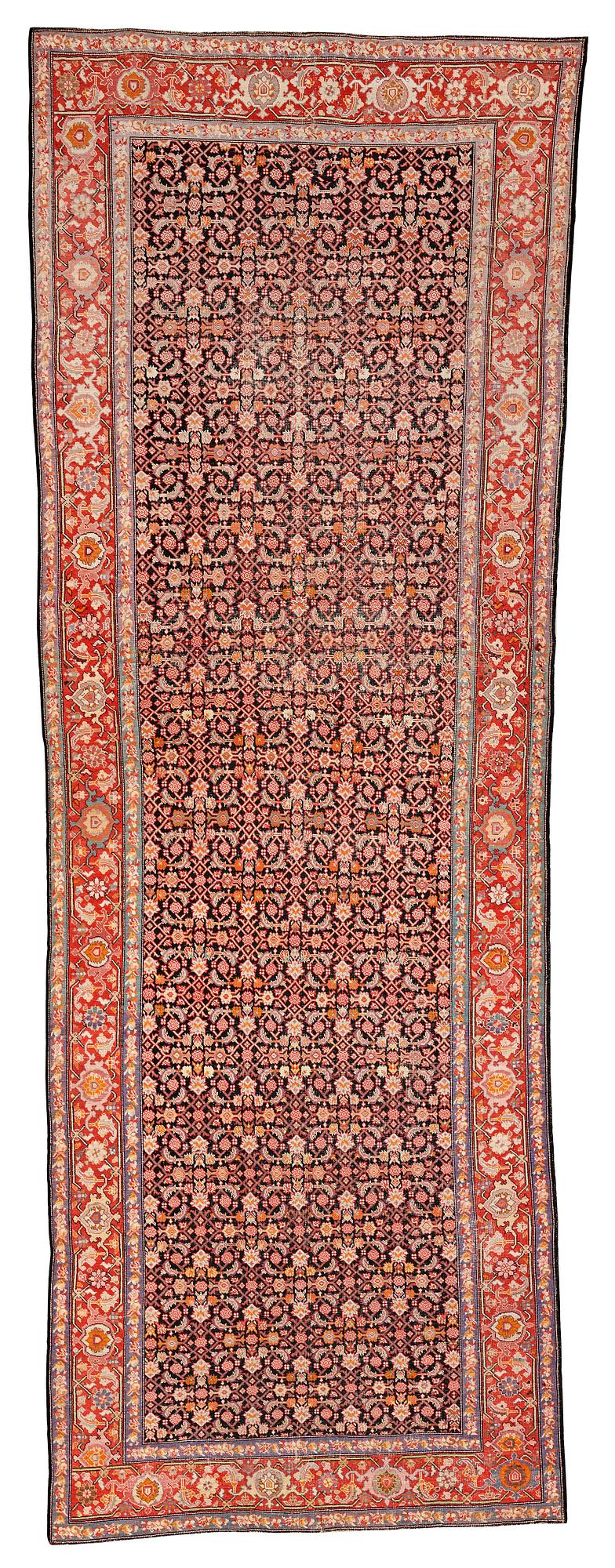MATTO, an antique Karabakh kelly, ca 575,5 x 209 cm.