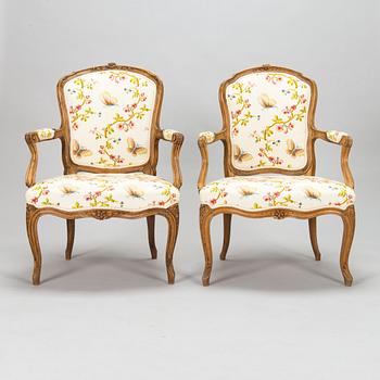 Two French, mid-18th-century Louis XV open armchairs.