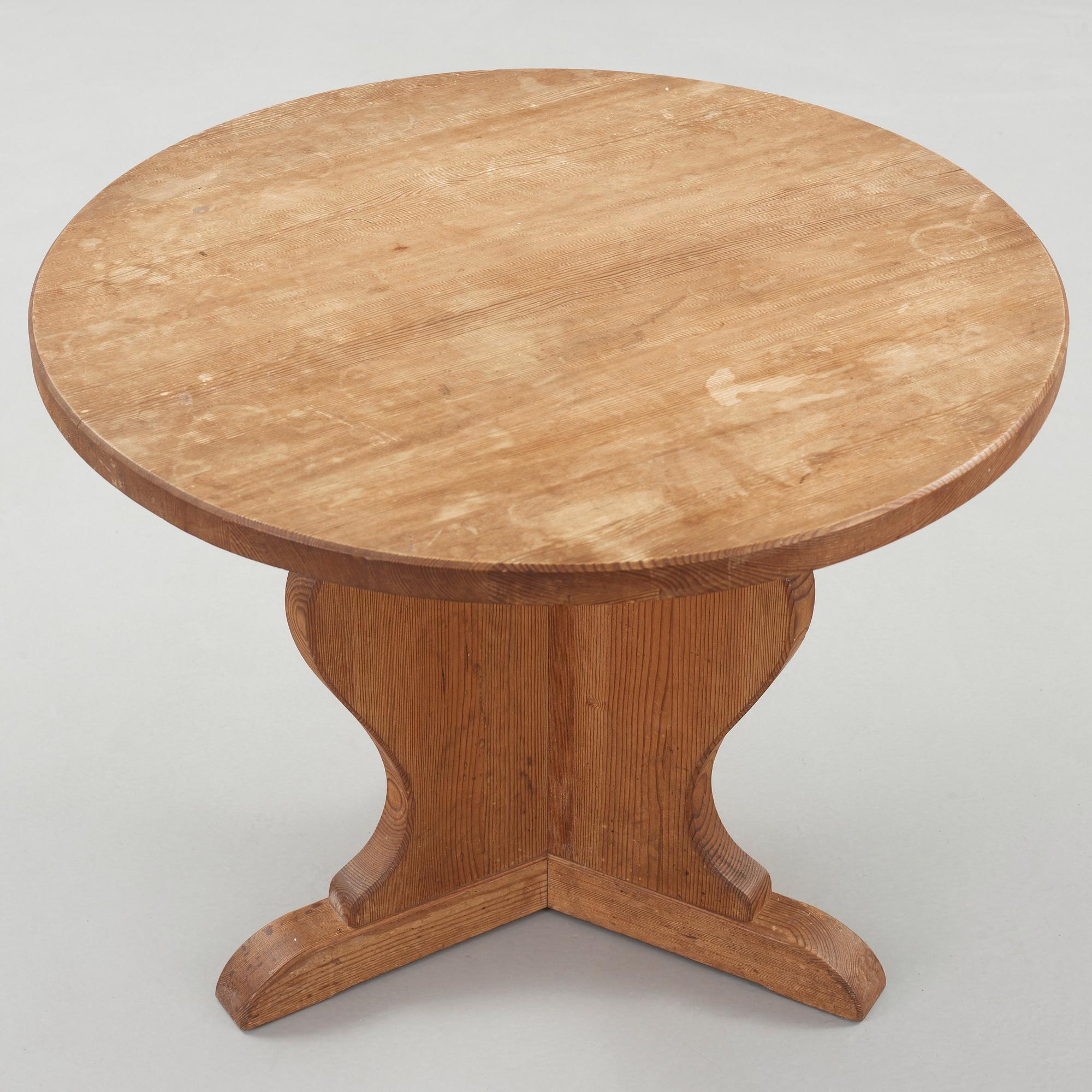 A stained pine table attributed to Axel Einar Hjorth, Nordiska Kompaniet, Sweden 1930's.