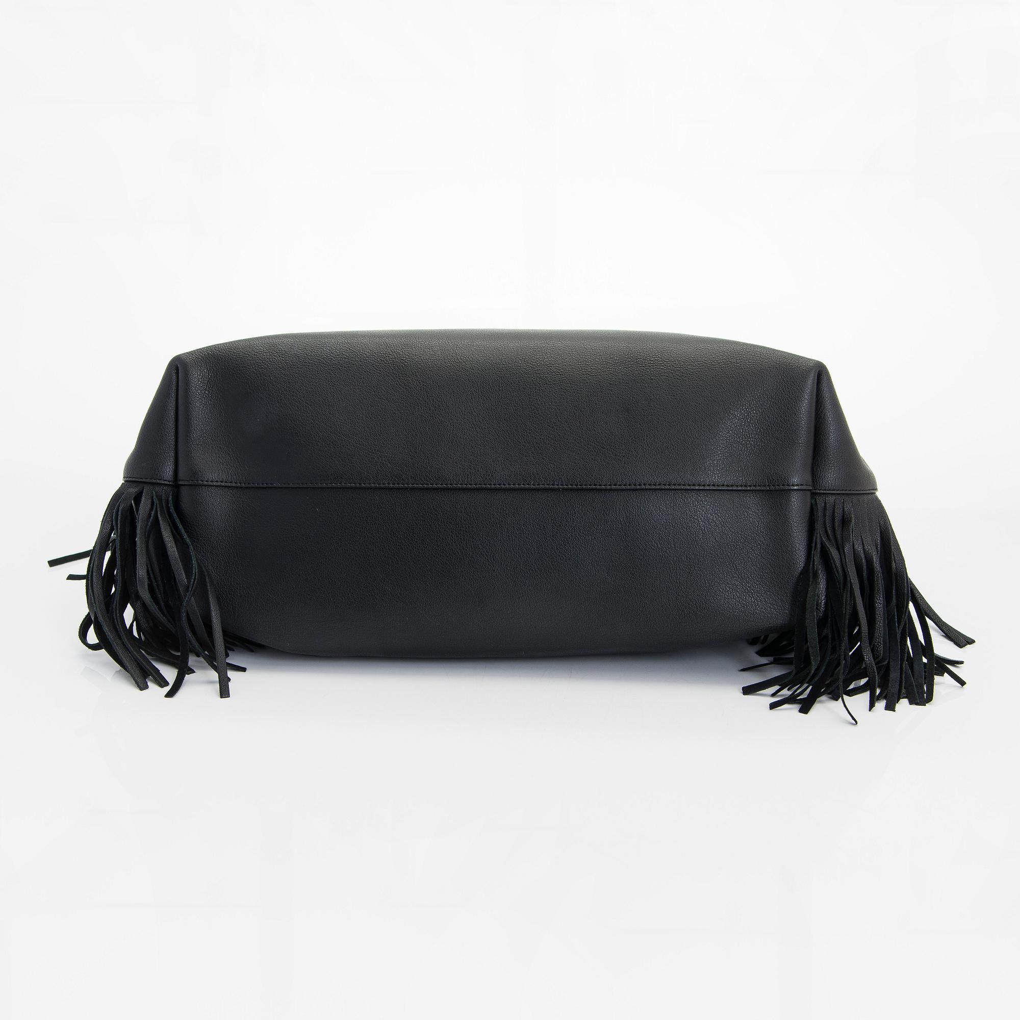 Saint Laurent, a 'Sac shopping' bag.