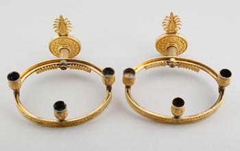 VÄGGAPPLIQUER, 1 par, förgylld brons, empire, 1800-talets första hälft.