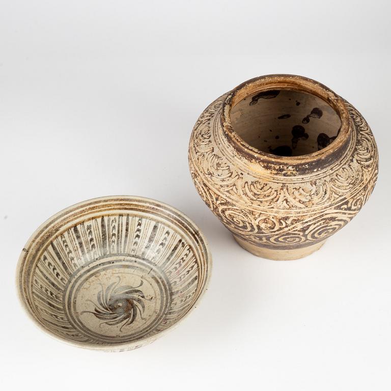 A brown glazed jar and bowl, Sawankhalok, Thailand, 14th/17th Century.