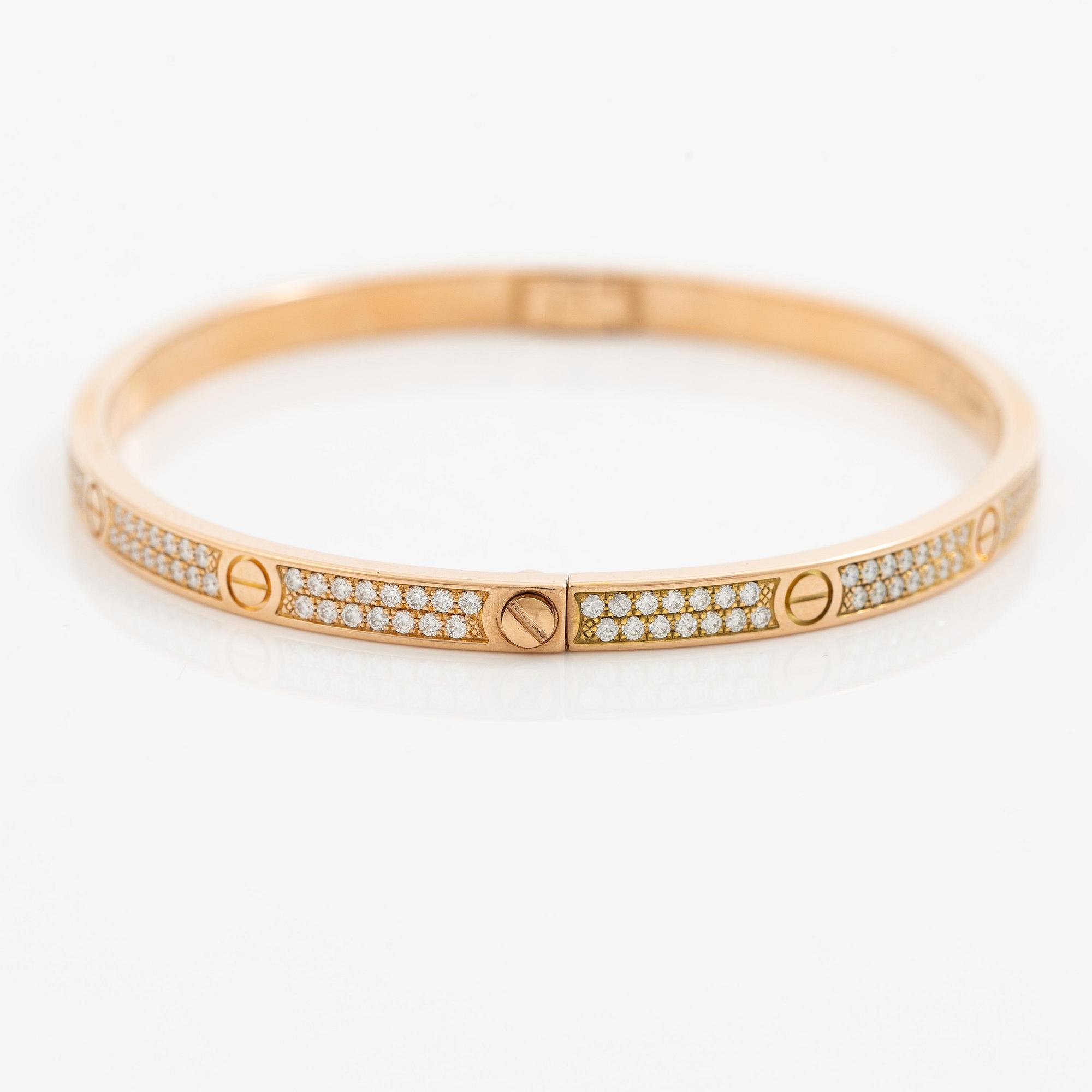 A Cartier bangle "Love" 18K rose gold with round brilliant-cut diamonds.