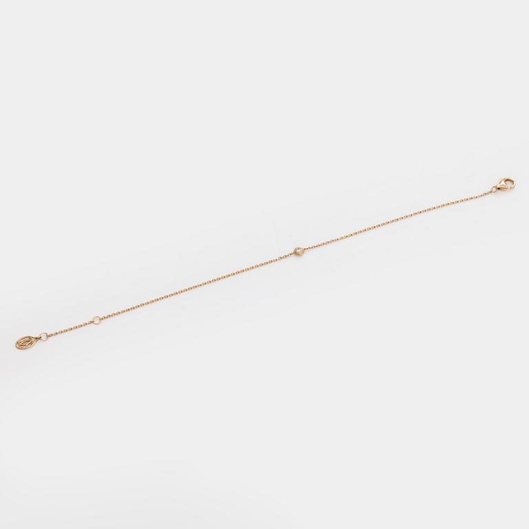 Cartier, armband, "d'Amour", 18K guld med en briljantslipad diamant.