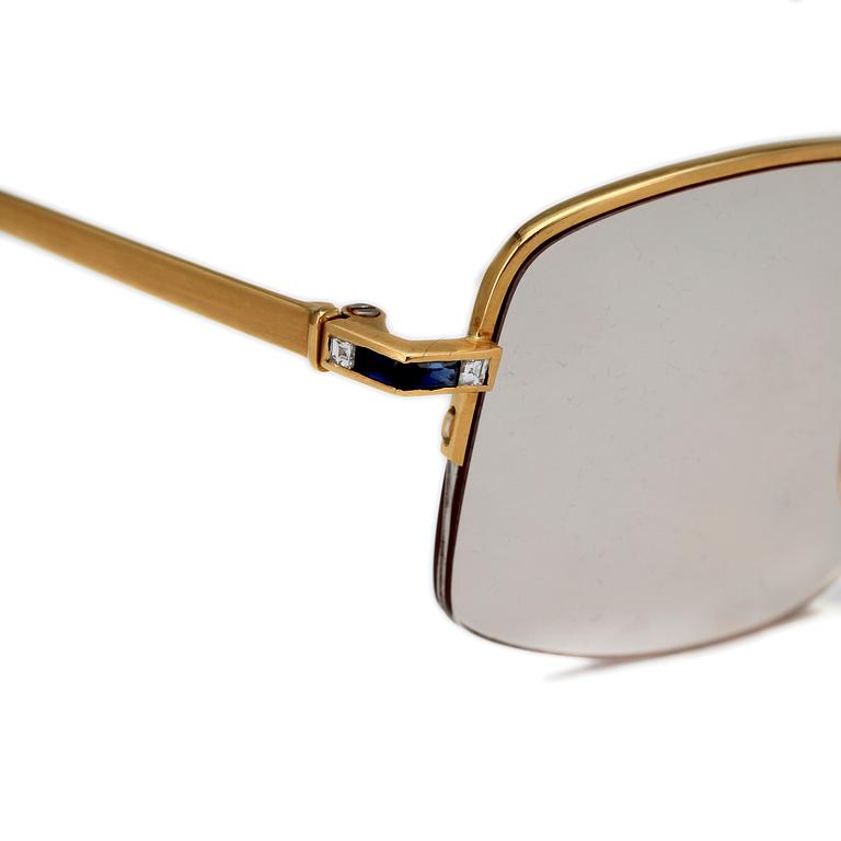 GLASÖGON, guld med carréslipade diamanteroch blå safirer. Lotus, Tyskland. Total vikt 33,2.