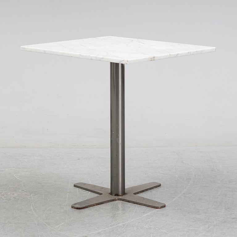 A marble top table, 21th century.
