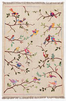 A hand-embroidered kelim rug, c. 183 x 125 cm.