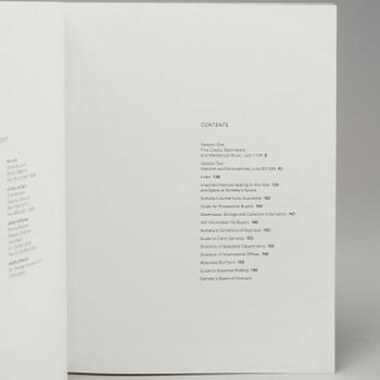 A set of 6 watch books.
