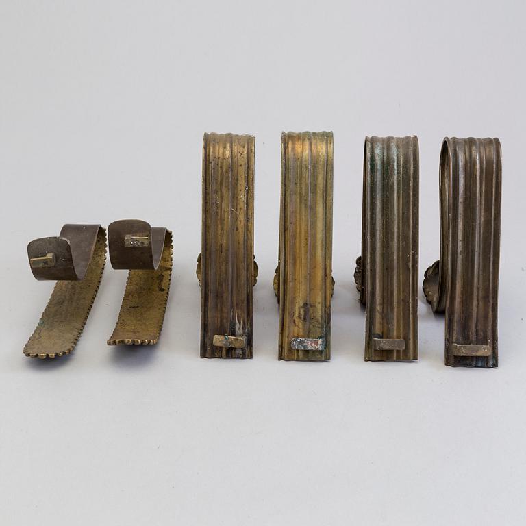 SIX BRONZE CURTAIN TIE-BACKS (4+2), 19th century.