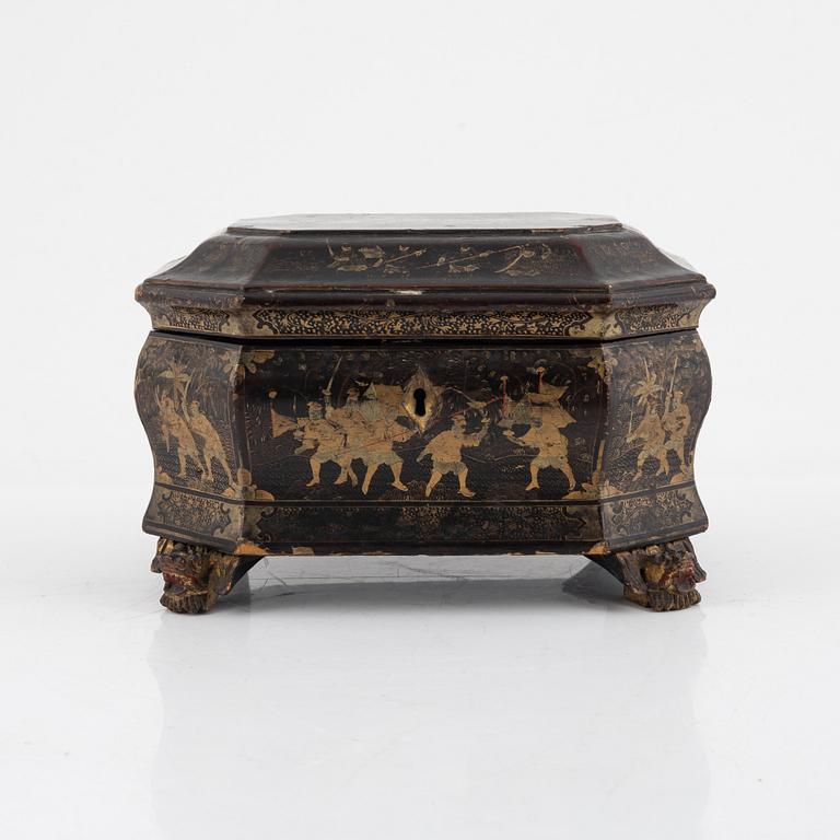 A Chinese lacquered tea caddy with pewter inserts, Qing dynasty, 19th century.