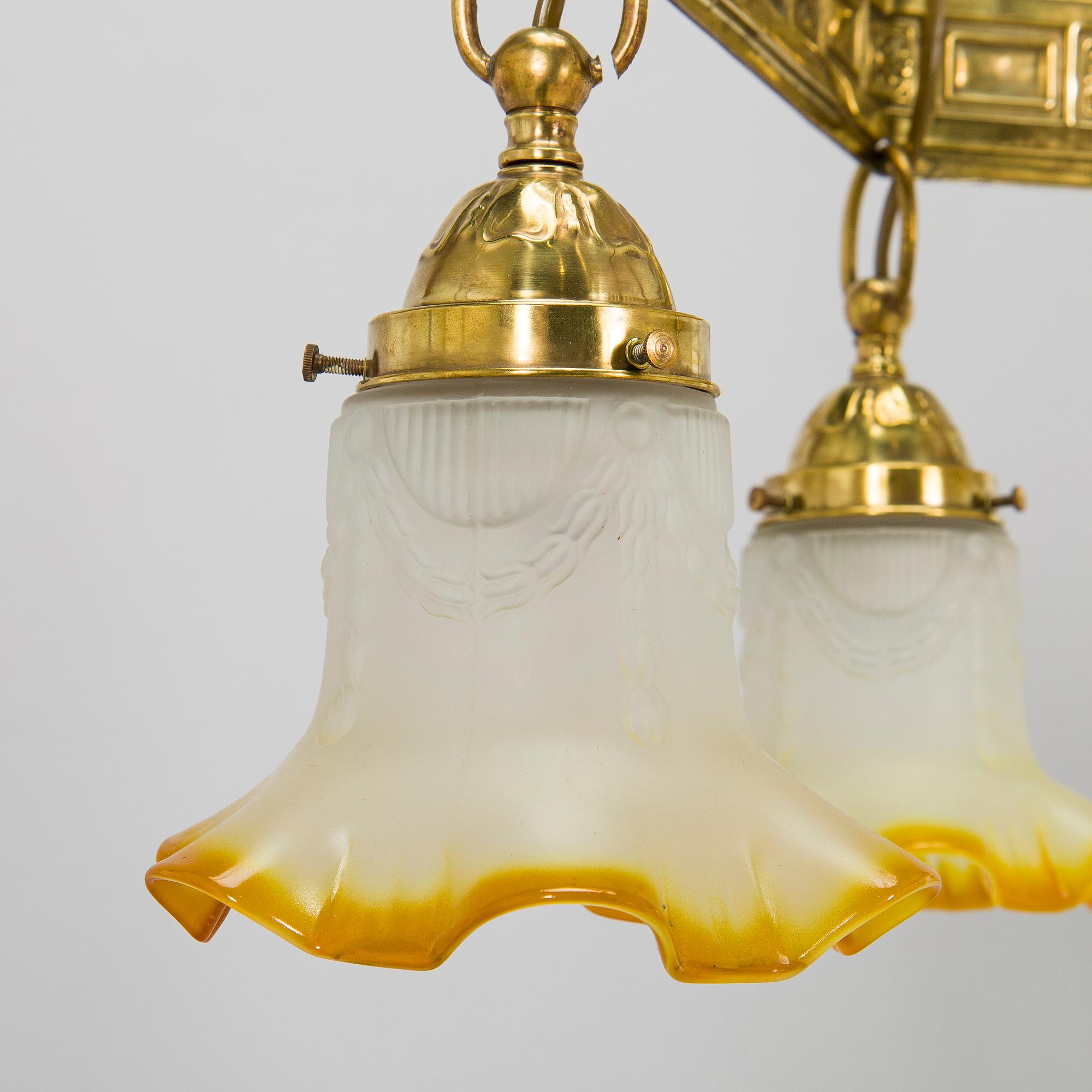 Kattokruunu, 1900-luvun alku.