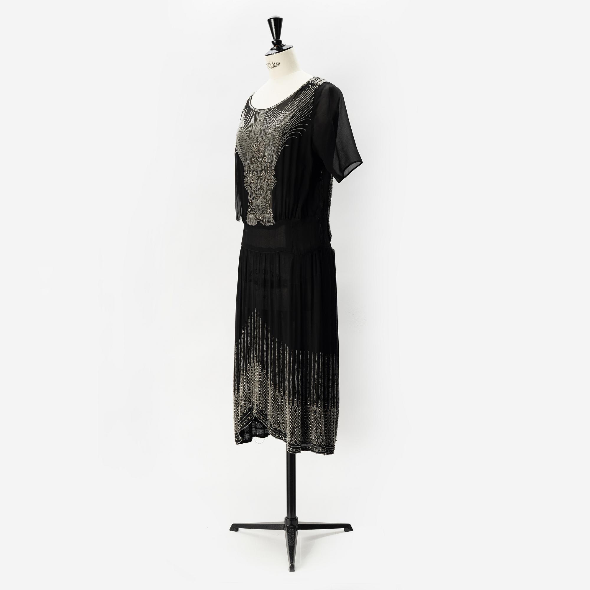 A 1920's pearl embroidered dress.
