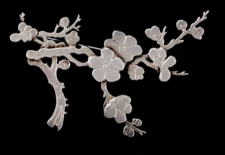 A Wiwen Nilsson sterling brooch of a branch of cherry blossom, Lund 1965.