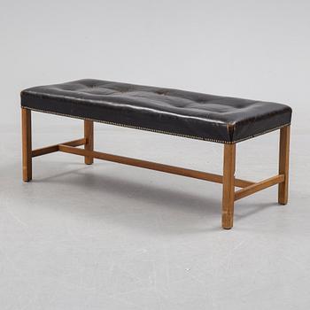 JOSEF FRANK, leather stool/bench, Firma Svenskt Tenn, model 2082.