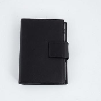 Prada, agenda.