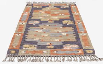 Märta Måås-Fjetterström, a carpet, 'Tolvbladsmattan', flat weave, c. 205 x 95 cm, signed MMF.
