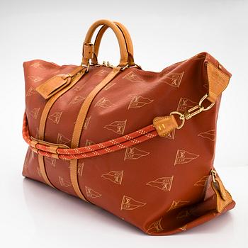 Louis Vuitton, an 'America's Cup Canvas Duffle' travel bag.