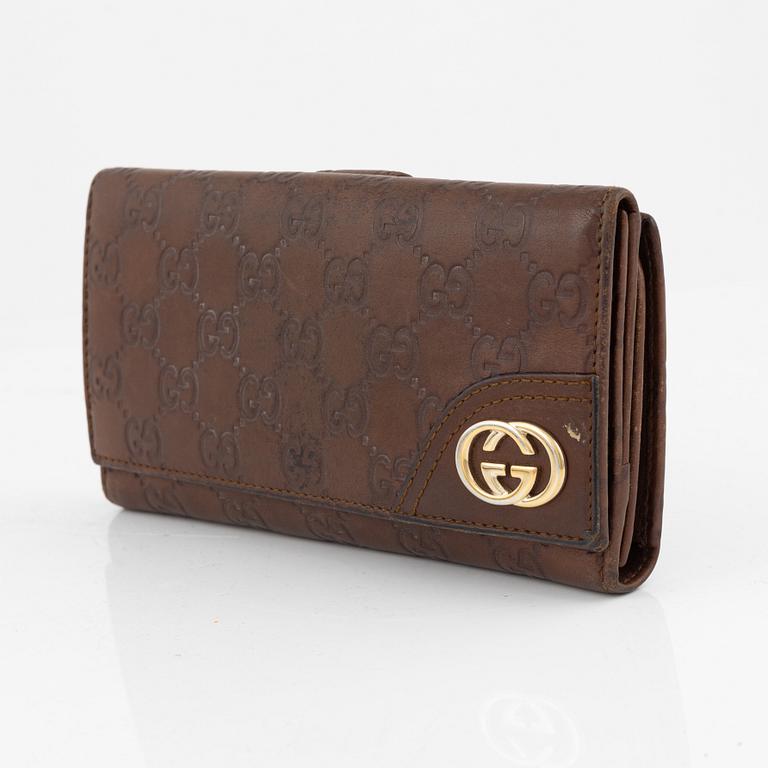Gucci, leather wallet.