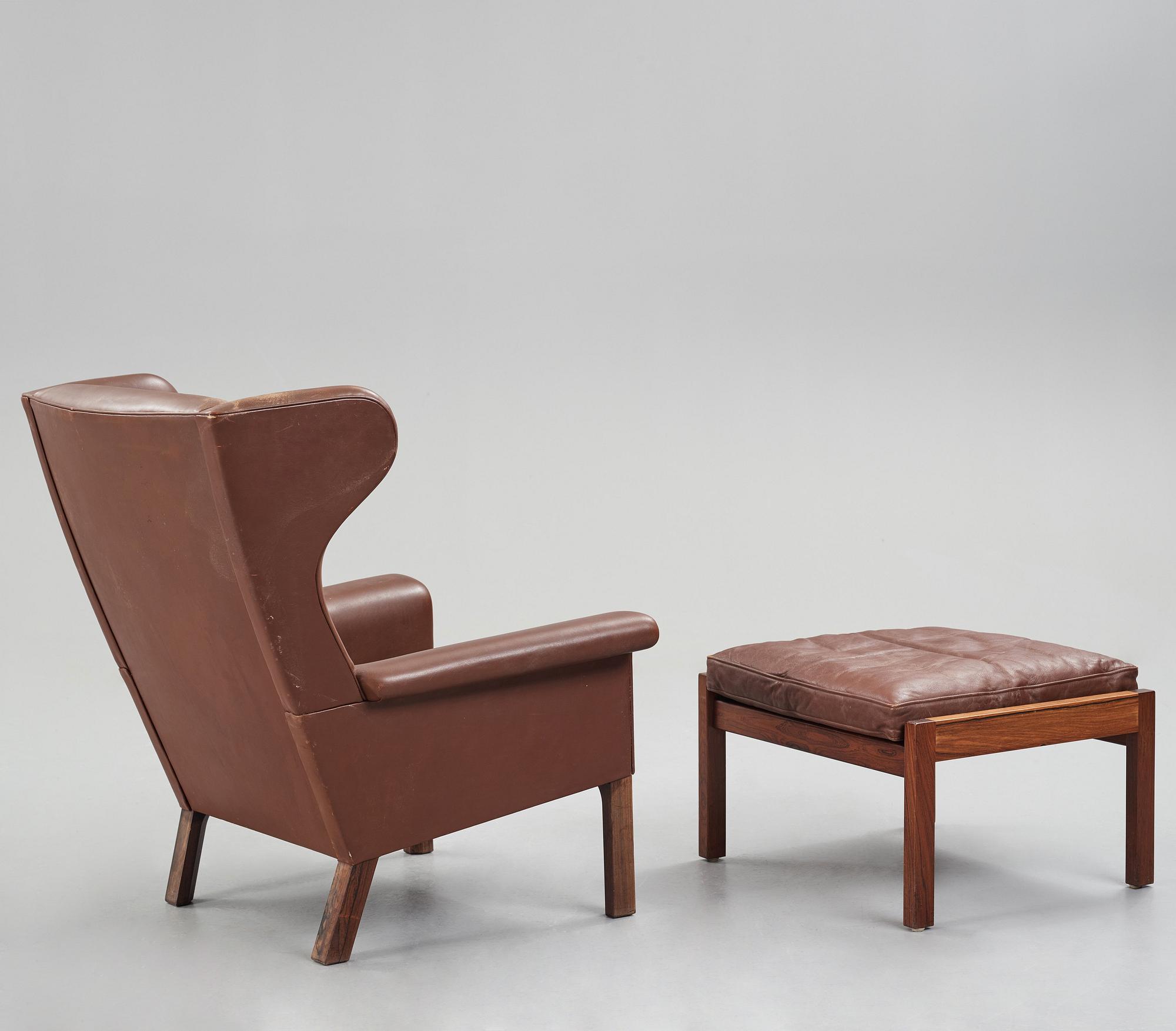 Hans J. Wegner, a pair of "AP-65" easy chairs with stools, AP-stolen, Denmark 1960's.