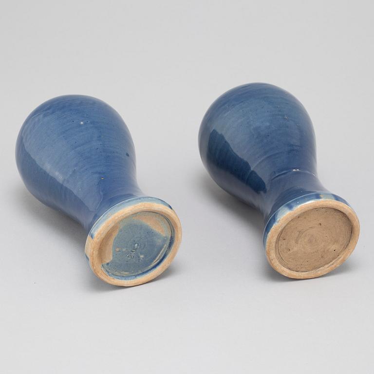 A pair of blue glazed meiping vases, 17th Century.