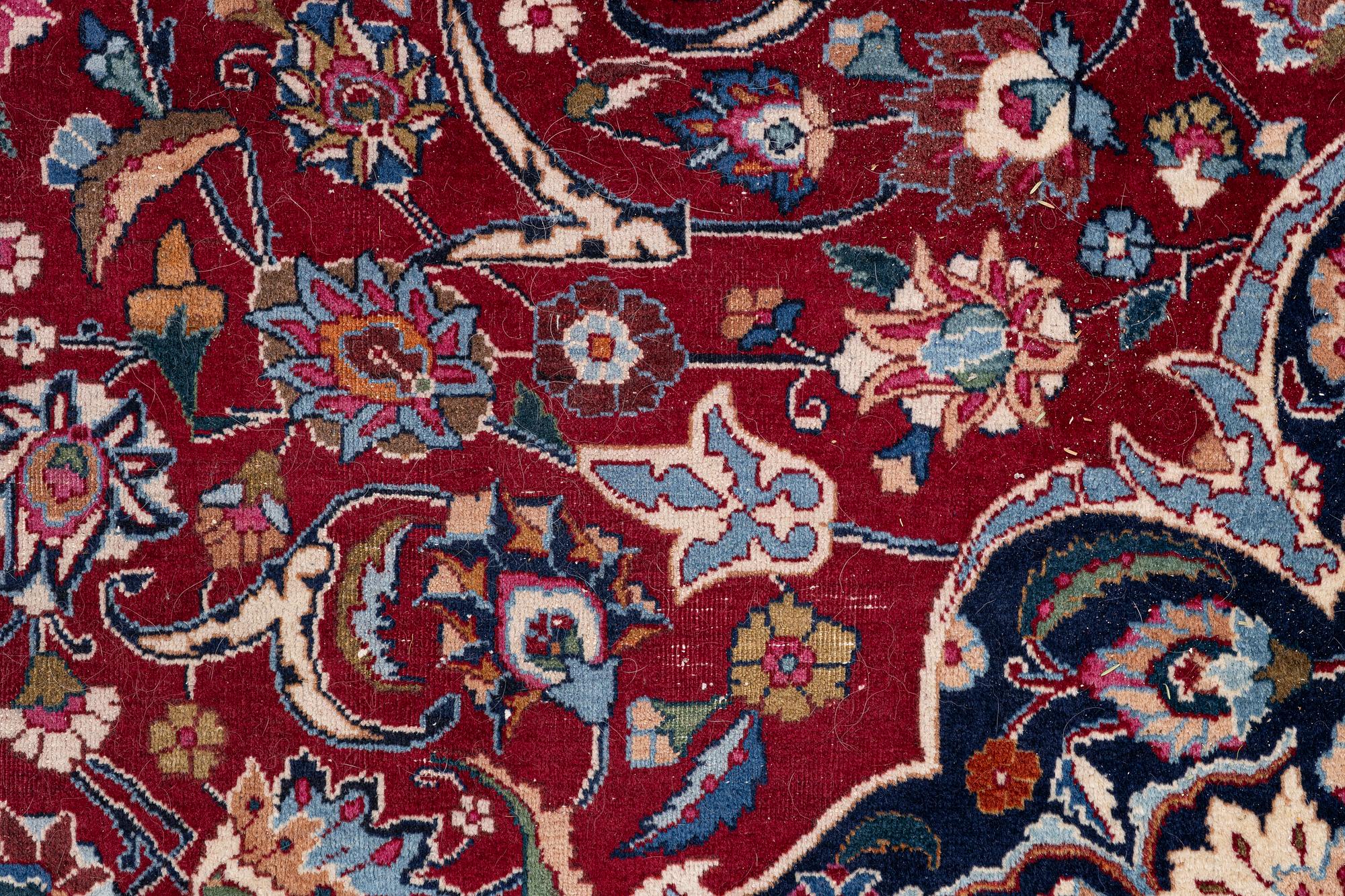 A oriental carpet, c. 375 x 290 cm.