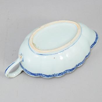 Two blue and white serving dishes and a sauce boat, Qing dynasty, Qianlong (1736-95).