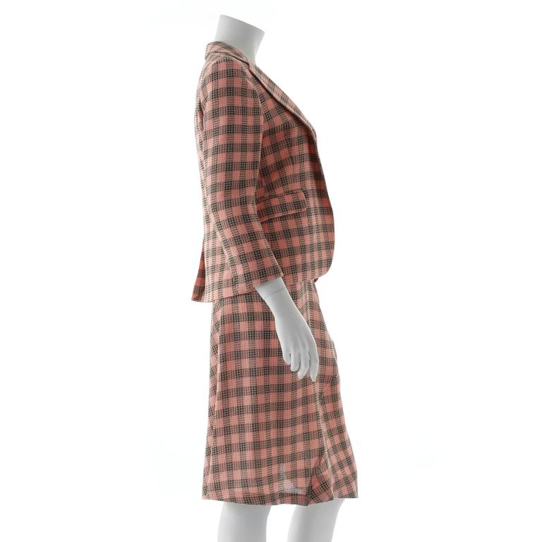 MARNI, a two-piece pink and grey wool dress consisting of jacket and skirt.