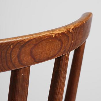 Axel Einar Hjorth, a set of three stained pine "Utö" chairs, Nordiska Kompaniet, Sweden, 1930s.
