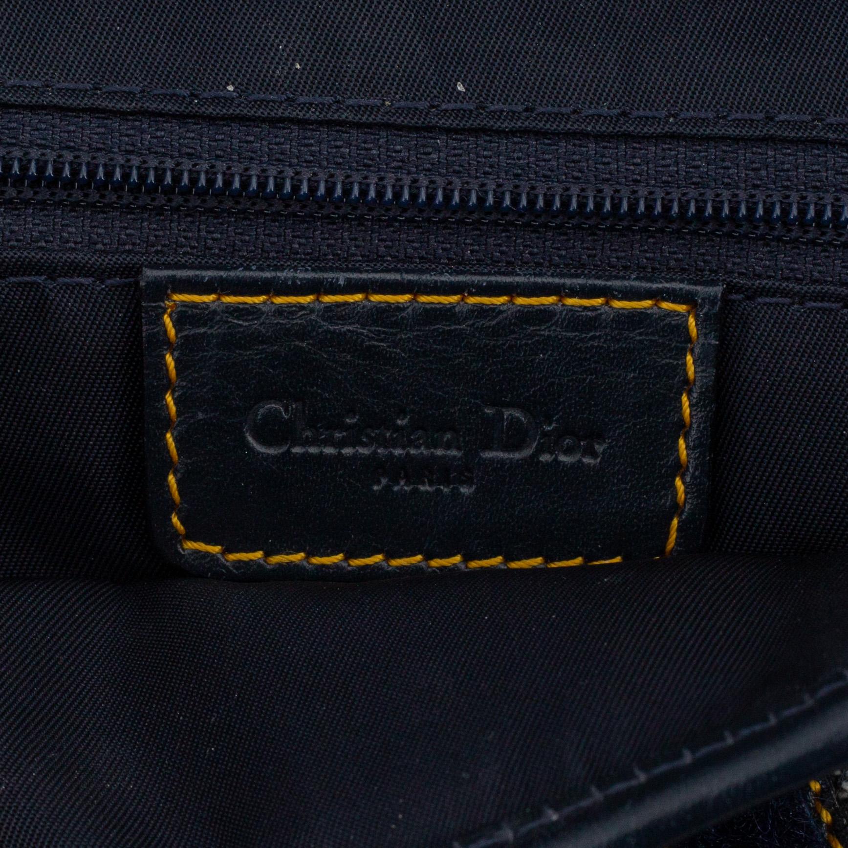 CHRISTIAN DIOR, a vintage mpnpgram canvas 'Saddle Bag!.